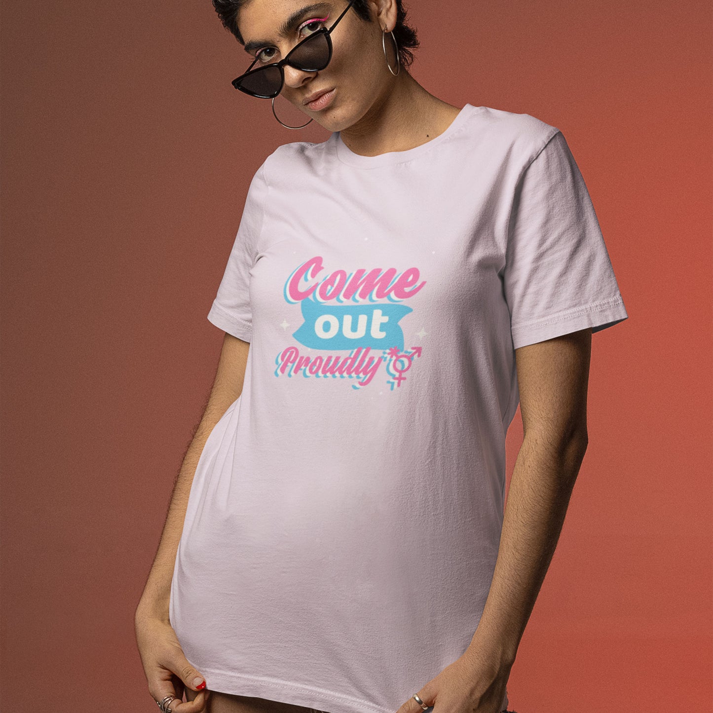 Baby Pink "Come Out Proudly" T-Shirt, part of the Pride Collection.