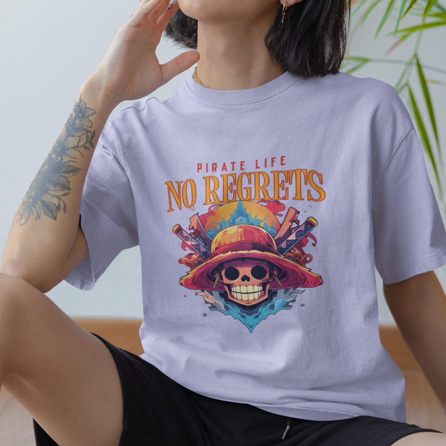 Female model in a lavender oversized Pirate Life T-Shirt with anime print
